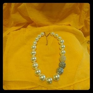 Necklace with three side Rhinestone balls.